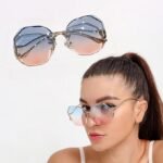 نظارة شمسية نسائية متدرجة بدون إطار بإطار معدني ذهبي وعدسات زرقاء وردية UV400